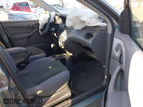 2004 Ford Focus SE with VIN 1FAFP34Z94W157468, listed as a IAAI auction lot 41311417 with Not Provided miles and . Bid and sale history available at DreamBid. Image 5.