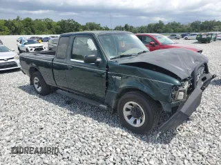 2002 Ford Ranger XLT Appearance with VIN 1FTYR44E42TA32828, listed as a Copart auction lot 60205715 with 290,846 mi miles and Salvage title. Bid and sale history available at DreamBid. Image 4.