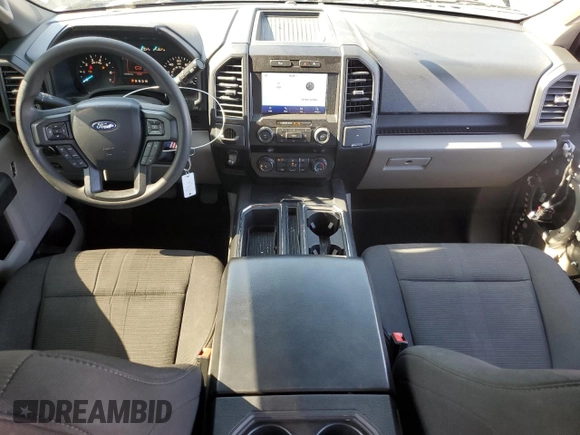 2020 Ford F-150 XL with VIN 1FTEW1CP0LFA72448, listed as a Copart auction lot 59237885 with 87,060 mi miles and Salvage title. Bid and sale history available at DreamBid. Image 8.