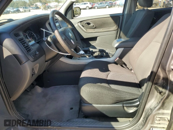 2006 Mazda Tribute S with VIN 4F2YZ041X6KM24035, listed as a Copart auction lot 45943285 with 105,040 mi miles and Salvage Title. Bid and sale history available at DreamBid. Image 7.