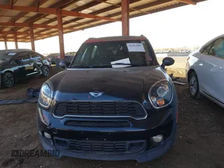 2014 MINI Countryman S with VIN WMWZC5C57EWP39919, listed as a IAAI auction lot 41613909 with 139,138 mi miles and . Bid and sale history available at DreamBid. Image 13.