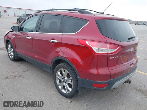 2014 Ford Escape SE with VIN 1FMCU9G90EUD89356, listed as a IAAI auction lot 41841229 with 148,997 mi miles and . Bid and sale history available at carsss.com. Image 3.