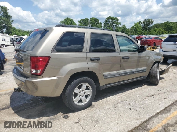 2005 Jeep Grand Cherokee Laredo with VIN 1J4HR48N65C608296, listed as a Copart auction lot 58862875 with 168,421 mi miles and Salvage title. Bid and sale history available at DreamBid. Image 3.