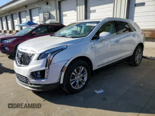 2021 Cadillac XT5 FWD Premium Luxury with VIN 1GYKNCRS0MZ198199, listed as a Copart auction lot 83595494 with 27,923 mi miles and Salvage Title. Bid and sale history available at carsss.com. Image 1.