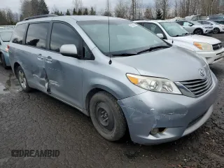 2014 Toyota Sienna LE AAS with VIN 5TDKK3DC3ES459861, listed as a Copart auction lot 47393485 with 144,520 mi miles and Salvage title. Bid and sale history available at DreamBid. Image 4.