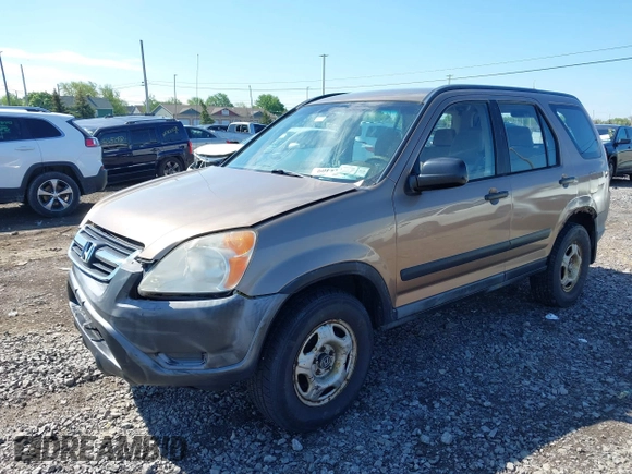 2002 Honda CR-V LX z VIN JHLRD78402C068542, wystawiony jako IAAI lot #42265409 z przebiegiem 205 650 mil mil oraz . Historia ofert i sprzedaży dostępna na DreamBid. Obrazek 17.
