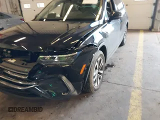 2023 Volkswagen Tiguan S z VIN 3VVRB7AX6PM069001, wystawiony jako IAAI lot #41193316 z przebiegiem 21 586 mil mil oraz . Historia ofert i sprzedaży dostępna na DreamBid. Obrazek 16.