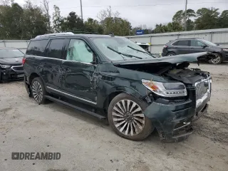 2021 Lincoln Navigator Reserve with VIN 5LMJJ2KT3MEL14652, listed as a Copart auction lot 44128165 with Not provided miles and Salvage title. Bid and sale history available at DreamBid. Image 4.