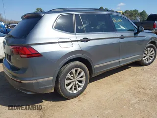 2018 Volkswagen Tiguan SEL with VIN 3VV3B7AX6JM001231, listed as a IAAI auction lot 41781659 with 137,930 mi miles and . Bid and sale history available at DreamBid. Image 4.