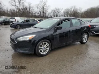 2017 Ford Focus SE with VIN 1FADP3F2XHL316724, listed as a Copart auction lot 52321155 with 137,005 mi miles and Salvage Title. Bid and sale history available at DreamBid. Image 1.