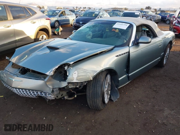 2004 Ford Thunderbird Pacific Coast Roadster with VIN 1FAHP63AX4Y107544, listed as a IAAI auction lot 41441354 with Not Provided miles and . Bid and sale history available at DreamBid. Image 6.