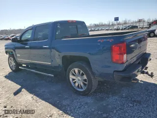 2017 Chevrolet Silverado 1500 High Country with VIN 3GCUKTEC4HG130595, listed as a Copart auction lot 46043255 with 105,670 mi miles and Salvage Title. Bid and sale history available at carsss.com. Image 2.