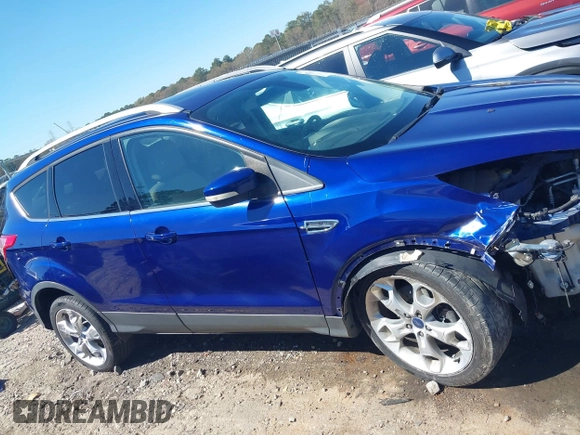2015 Ford Escape Titanium with VIN 1FMCU0J93FUC20745, listed as a IAAI auction lot 41781551 with 174,538 mi miles and . Bid and sale history available at DreamBid. Image 14.
