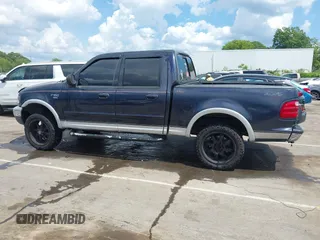 2001 Ford F-150 XLT z VIN 1FTRW08LX1KD56482, wystawiony jako IAAI lot #42155153 z przebiegiem 340 009 mil mil oraz . Historia ofert i sprzedaży dostępna na DreamBid. Obrazek 14.
