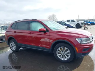 2018 Volkswagen Tiguan S with VIN 3VV1B7AX0JM043255, listed as a IAAI auction lot 41641512 with 79,069 mi miles. Bid and sale history available at carsss.com. Image 13.