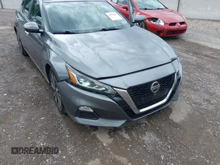 2021 Nissan Altima 2.5 SV with VIN 1N4BL4DV0MN329261, listed as a IAAI auction lot 39970665 with 70,287 mi miles. Bid and sale history available at carsss.com. Image 6.