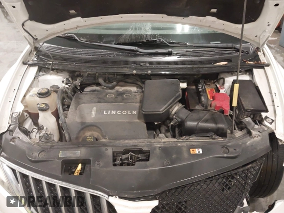 2011 Lincoln MKX with VIN 2LMDJ8JK8BBJ34012, listed as a IAAI auction lot 41524792 with 142,670 mi miles. Bid and sale history available at carsss.com. Image 10.