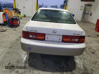1999 Lexus ES 300 Luxury Sport Sdn with VIN JT8BF28G0X0233986, listed as a Copart auction lot 82440944 with 129,656 mi miles and Salvage Title. Bid and sale history available at carsss.com. Image 6.