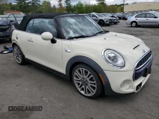 2017 MINI Convertible Cooper S с VIN WMWWG9C5XH3C80635, выставлен на аукционе Copart как лот 56167715 с пробегом 79 485 миль миль и Списание • Salvage title. История ставок и продаж доступна на DreamBid. Изображение 4.