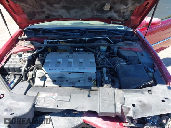 2002 Cadillac Eldorado ESC z VIN 1G6EL12Y72B102153, wystawiony jako IAAI lot #41861541 z przebiegiem 91 273 mil mil oraz . Historia ofert i sprzedaży dostępna na DreamBid. Obrazek 10.