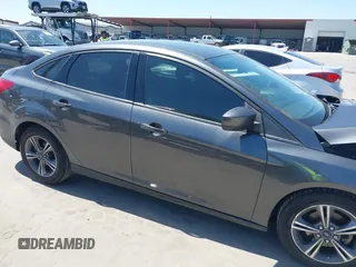 2018 Ford Focus SE with VIN 1FADP3FE3JL204220, listed as a IAAI auction lot 41972960 with 62,682 mi miles and . Bid and sale history available at DreamBid. Image 13.
