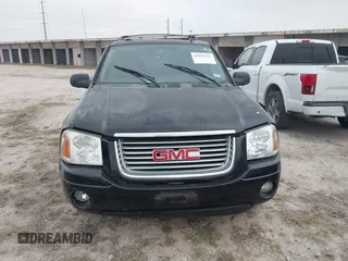 2006 GMC Envoy SLT with VIN 1GKDS13S462241866, listed as a IAAI auction lot 41943322 with 90,695 mi miles. Bid and sale history available at carsss.com. Image 12.