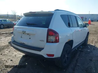 2014 Jeep Compass Latitude with VIN 1C4NJDEB8ED622012, listed as a IAAI auction lot 41917126 with 143,065 mi miles. Bid and sale history available at carsss.com. Image 4.