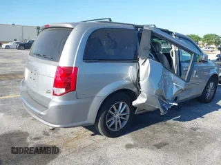 2015 Dodge Grand Caravan SXT with VIN 2C4RDGCG3FR592098, listed as a IAAI auction lot 42038665 with 104,092 mi miles and . Bid and sale history available at DreamBid. Image 4.