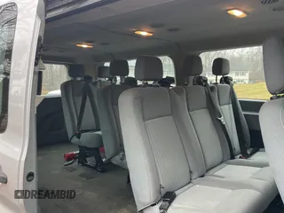 2015 Ford Transit Passenger XL with VIN 1FBZX2YGXFKA96110, listed as a Copart auction lot 84711064 with 169,835 mi miles and Clean Title. Bid and sale history available at DreamBid. Image 6.