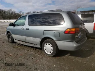 2000 Toyota Sienna LE with VIN 4T3ZF13C7YU235777, listed as a Copart auction lot 43792734 with 223,722 mi miles and Salvage Title. Bid and sale history available at carsss.com. Image 2.