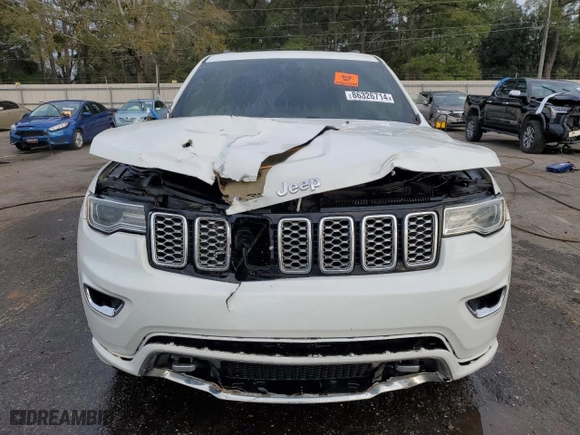 2021 Jeep Grand Cherokee Overland with VIN 1C4RJFCG1MC671472, listed as a Copart auction lot 86326714 with 103,760 mi miles and Salvage Title. Bid and sale history available at carsss.com. Image 5.