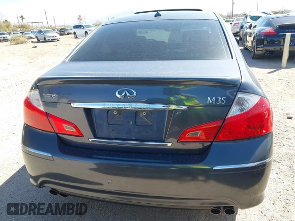 2010 Infiniti M with VIN JN1CY0AP0AM911640, listed as a IAAI auction lot 41549869 with 153,445 mi miles. Bid and sale history available at carsss.com. Image 16.