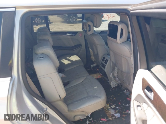2014 Mercedes-Benz GL 450 z VIN 4JGDF7CE4EA347876, wystawiony jako IAAI lot #42386949 z przebiegiem 133 400 mil mil oraz . Historia ofert i sprzedaży dostępna na DreamBid. Obrazek 8.