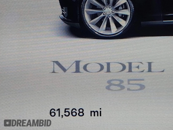 2013 Tesla Model S with VIN 5YJSA1CN0DFP20053, listed as a IAAI auction lot 41470660 with 61,568 mi miles and . Bid and sale history available at DreamBid. Image 7.