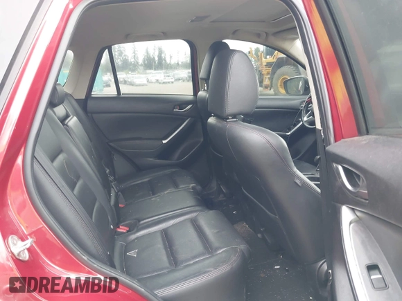 2016 Mazda CX-5 Grand Touring z VIN JM3KE4DY7G0687318, wystawiony jako IAAI lot #42228585 z przebiegiem 188 793 mil mil oraz . Historia ofert i sprzedaży dostępna na DreamBid. Obrazek 8.