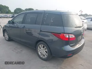 2012 Mazda 5 Sport with VIN JM1CW2BL6C0134921, listed as a IAAI auction lot 42290476 with 128,490 mi miles and . Bid and sale history available at DreamBid. Image 3.