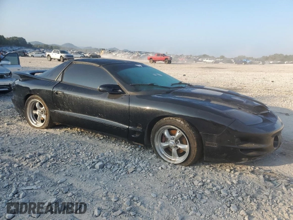 2000 Pontiac Firebird Formula z VIN 2G2FV22G4Y2175318, wystawiony jako Copart lot #68737224 z przebiegiem 229 394 mil mil oraz Szkoda całkowita • Salvage title. Historia ofert i sprzedaży dostępna na DreamBid. Obrazek 4.