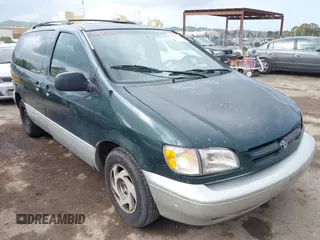 2000 Toyota Sienna LE with VIN 4T3ZF13C2YU303323, listed as a IAAI auction lot 41910267 with 214,508 mi miles. Bid and sale history available at carsss.com. Image 1.