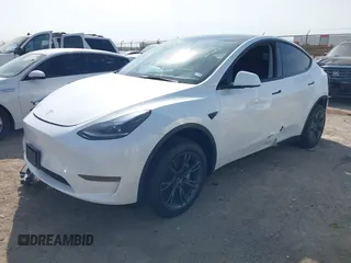 2025 Tesla Model Y Long Range z VIN 7SAYGDED7SA373784, wystawiony jako IAAI lot #41881719 z przebiegiem 1 192 mil mil oraz . Historia ofert i sprzedaży dostępna na DreamBid. Obrazek 21.