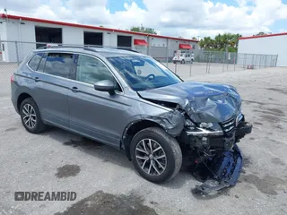 2019 Volkswagen Tiguan SE with VIN 3VV3B7AX7KM161135, listed as a IAAI auction lot 42595757 with 96,201 mi miles and . Bid and sale history available at DreamBid. Image 1.