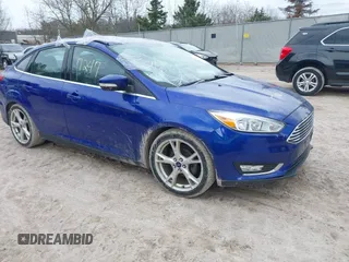 2015 Ford Focus Titanium with VIN 1FADP3J27FL298882, listed as a IAAI auction lot 42117247 with 124,185 mi miles and . Bid and sale history available at carsss.com. Image 1.