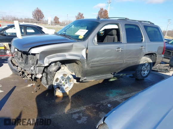 2012 Chevrolet Tahoe LS with VIN 1GNSKAE05CR278255, listed as a IAAI auction lot 41054601 with 205,470 mi miles and . Bid and sale history available at DreamBid. Image 2.
