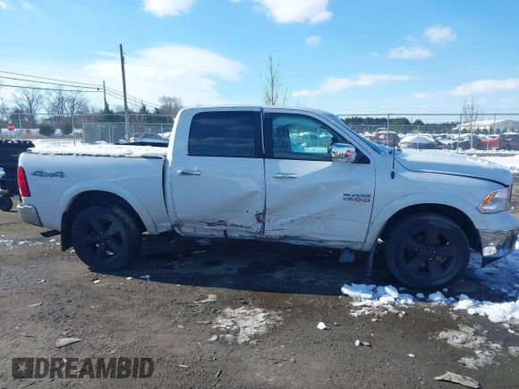 2018 Ram 1500 Big Horn z VIN 1C6RR7LG1JS113662, wystawiony jako IAAI lot #41274107 z przebiegiem 112 500 mil mil oraz . Historia ofert i sprzedaży dostępna na DreamBid. Obrazek 13.