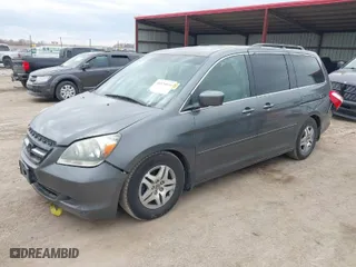 2007 Honda Odyssey EX-L with VIN 5FNRL386X7B423012, listed as a IAAI auction lot 41876854 with 266,588 mi miles. Bid and sale history available at carsss.com. Image 2.