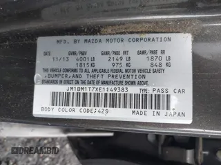 2014 Mazda 3 i SV with VIN JM1BM1T7XE1149383, listed as a IAAI auction lot 41236518 with Not Provided miles and . Bid and sale history available at DreamBid. Image 9.