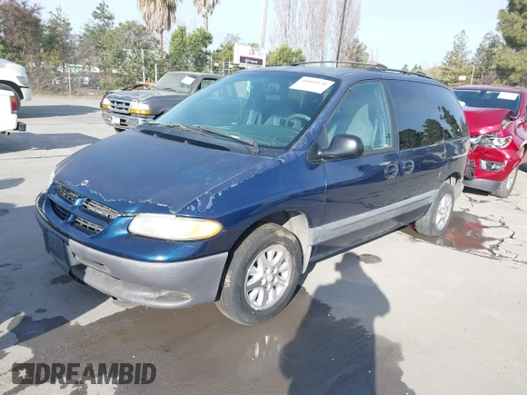 2000 Dodge Caravan SE with VIN 2B4GP45R9YR661145, listed as a IAAI auction lot 41819130 with 233,411 mi miles and . Bid and sale history available at DreamBid. Image 2.