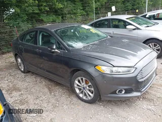 2015 Ford Fusion Titanium z VIN 3FA6P0K94FR181362, wystawiony jako IAAI lot #42786628 z przebiegiem 140 504 mil mil oraz . Historia ofert i sprzedaży dostępna na DreamBid. Obrazek 1.
