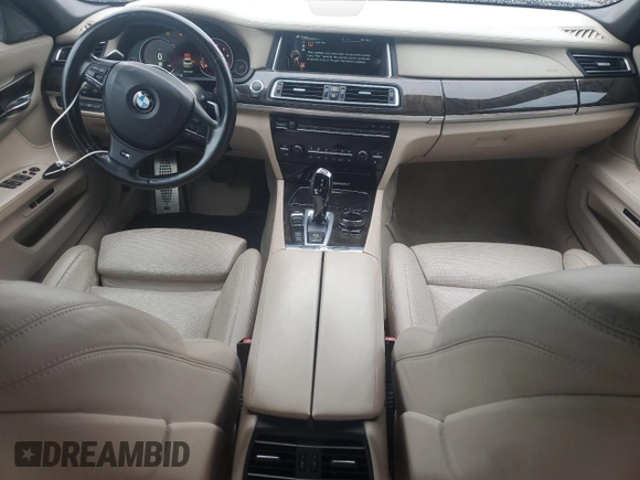 2015 BMW 7 Series 750Li z VIN WBAYE8C51FD781314, wystawiony jako Copart lot #56537395 z przebiegiem 69 682 mil mil oraz Szkoda całkowita • Salvage title. Historia ofert i sprzedaży dostępna na DreamBid. Obrazek 8.