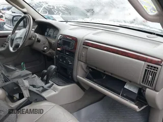 2004 Jeep Grand Cherokee Limited with VIN 1J8GW58J14C139431, listed as a IAAI auction lot 41519523 with 130,398 mi miles and . Bid and sale history available at DreamBid. Image 5.