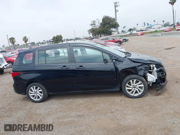 2015 Mazda 5 Sport с VIN JM1CW2BL2F0185045, выставлен на аукционе IAAI как лот 42487509 с пробегом 164 978 миль миль и . История ставок и продаж доступна на DreamBid. Изображение 14.